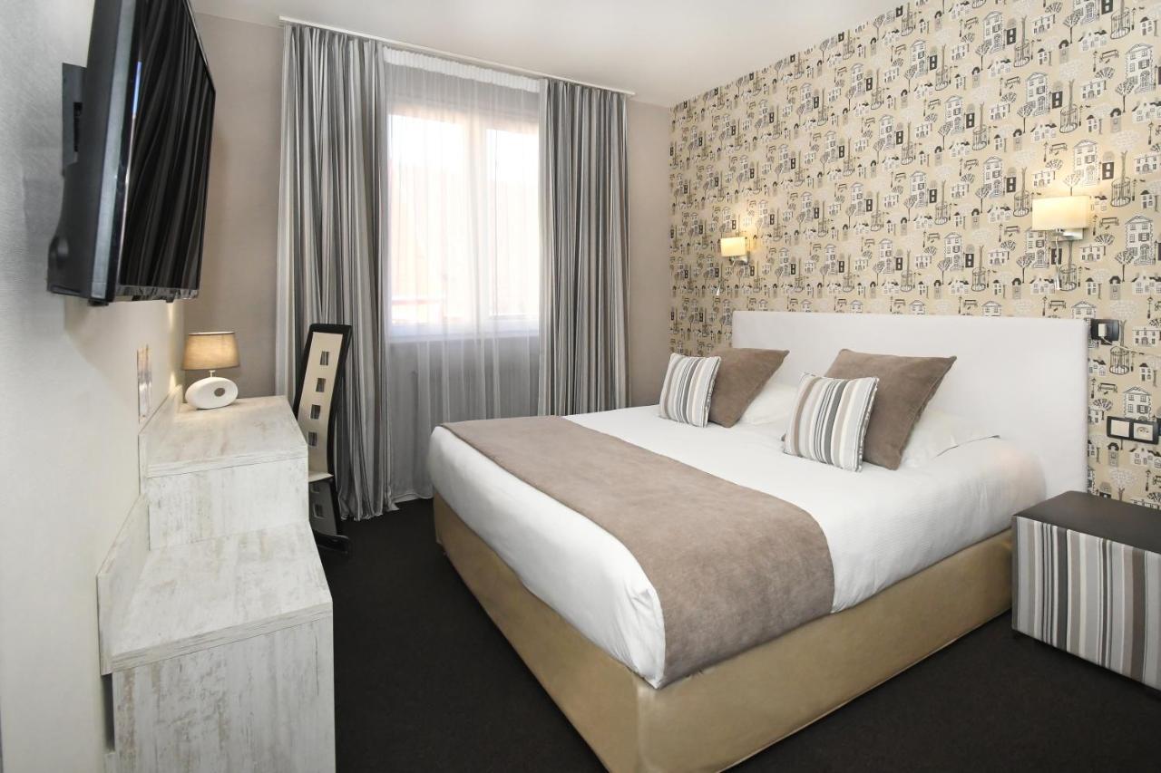 Logis Hotel Du Centre - Halte Ideale En Cyclotourisme Avec Garage A Velos Clos 몰세임 외부 사진